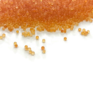 Orange Translucent- Microbeads (No Holes) 1.0mm - 1.2mm Caviar Beads https://www.artbeecrafts.com/products/orange-translucent-microbeads-no-holes-1-0mm-1-2mm-caviar-beads Orange Translucent- Microbeads 1.0mm - 1.2mm- No Holes Caviar Beads Tiny but dynamic, these undrilled microbeads add a textural dimension to designs. Excellent for scrapbooking, embellishments, jewelry, nail art, and many other home or professional décor projects. Size may vary. Options sold by the weight